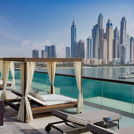 ホテル Hilton Dubai Palm Jumeirah エクステリア 写真 View of the Dubai Marina skyline from the hotel